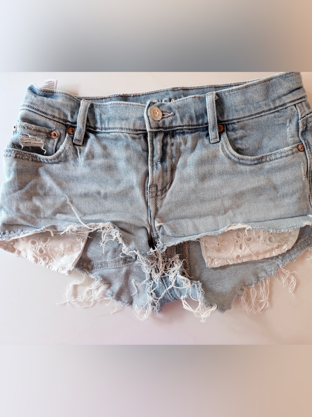 American Eagle Outfitters Light Wash Denim Cutoff Shorts with White Lace